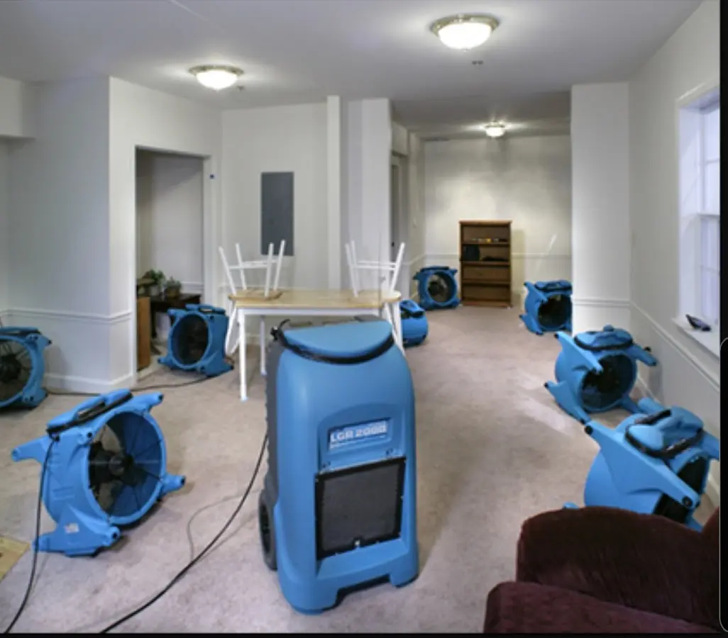 Air movers and dehumidifier setup for Water Extraction & Removal in Burton